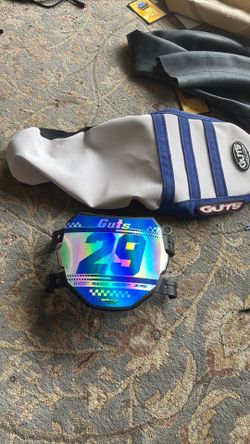 blue and white guts seat cover and odi plate with decal