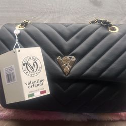 Valentino Orlandi Black quilted vegan leather shoulder bag W/  gold hardware.