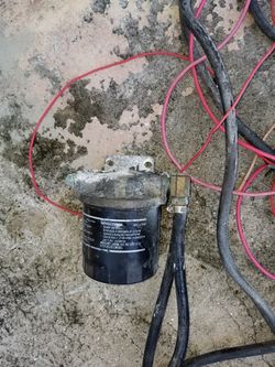 Fuel filter housing wash down pump