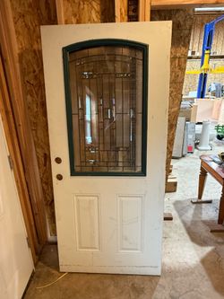 Steel front door glass