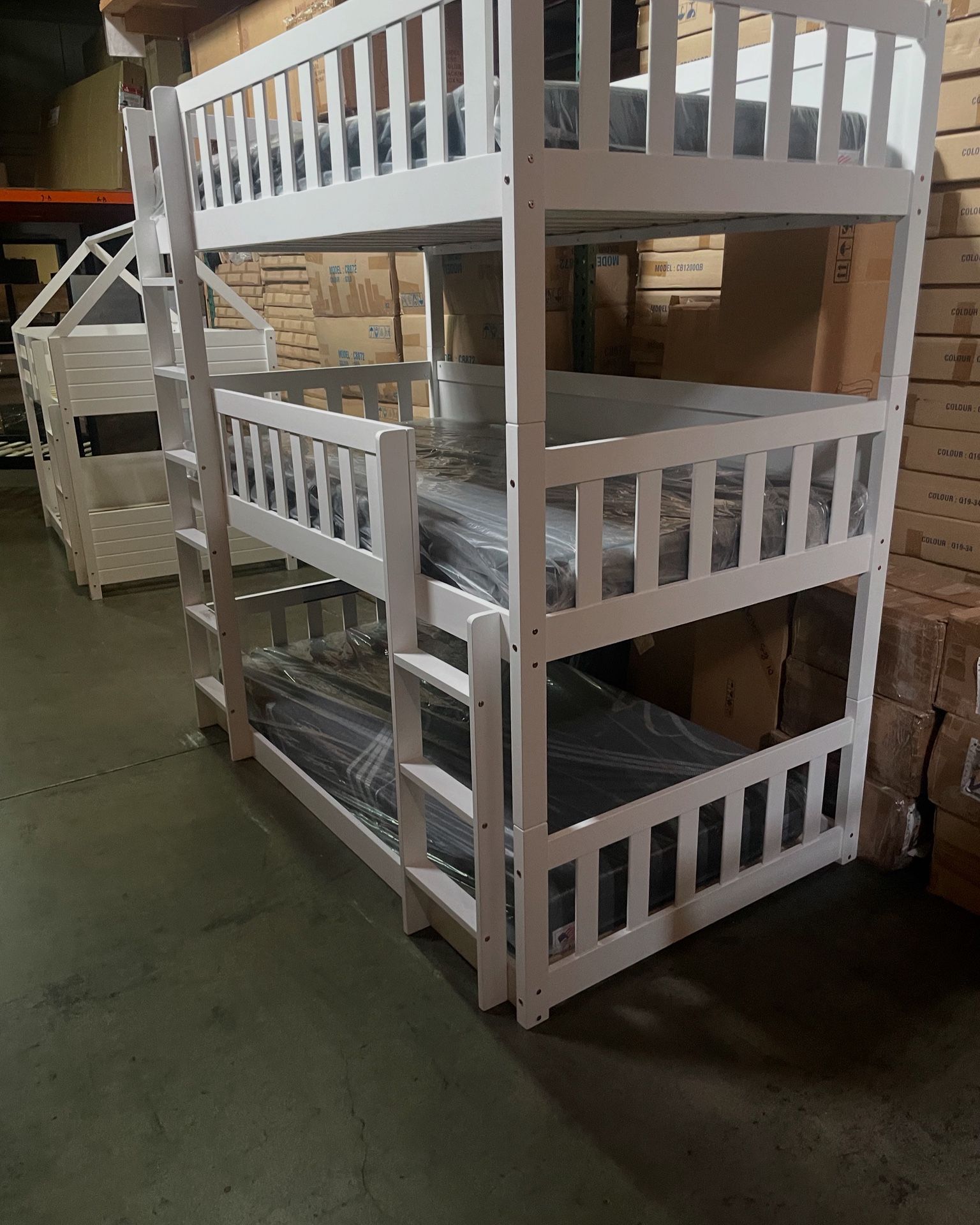 Triple bunk bed. Available in white & espresso. Assembly required. Assembly not included. Taxes included. Free delivery. Bunk bed only-$450 Bunk bed