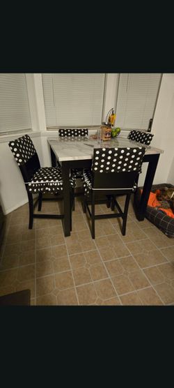 Dinning table( marble) with. 4 chairs