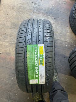 BRAND NEW SET (4) 205 40 17 ALL SEASON TIRES !!!