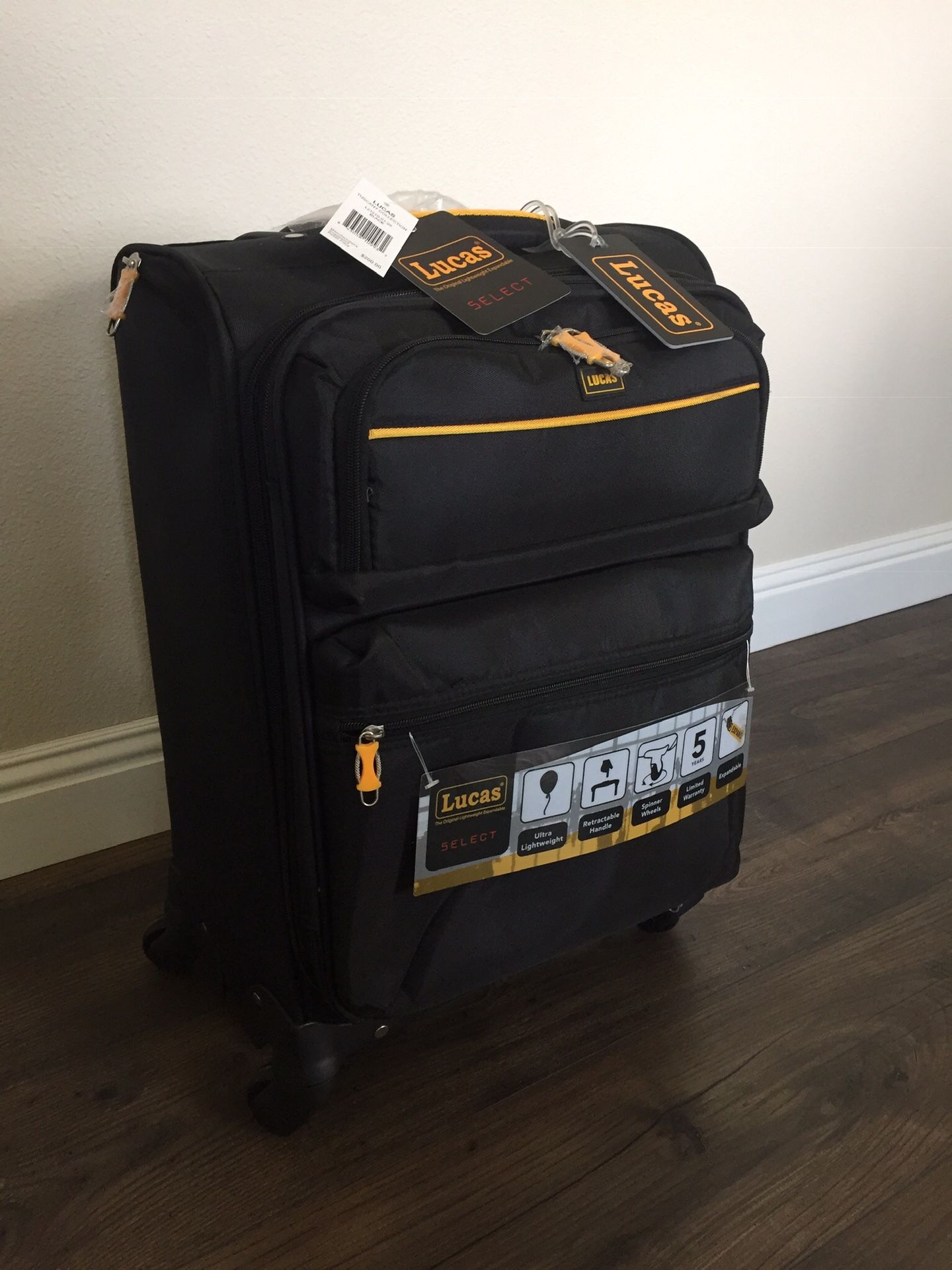 New With Tags. Lucas Tuscany collection carryon luggage.