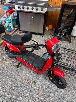 Red Electric Moped Scooter with Front Basket