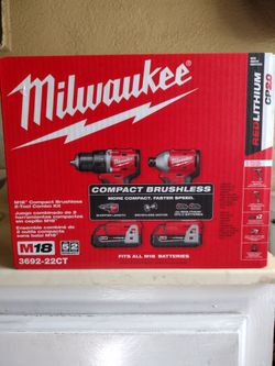 Milwaukee M18 Cordless Brushless Drill & Impact Driver Combo Kit. $200