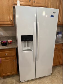 Whirlpool refrigerator- like new