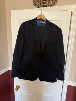 Dark navy blue suit, INC brand, size XL, trousers size 36x30, in excellent condition.