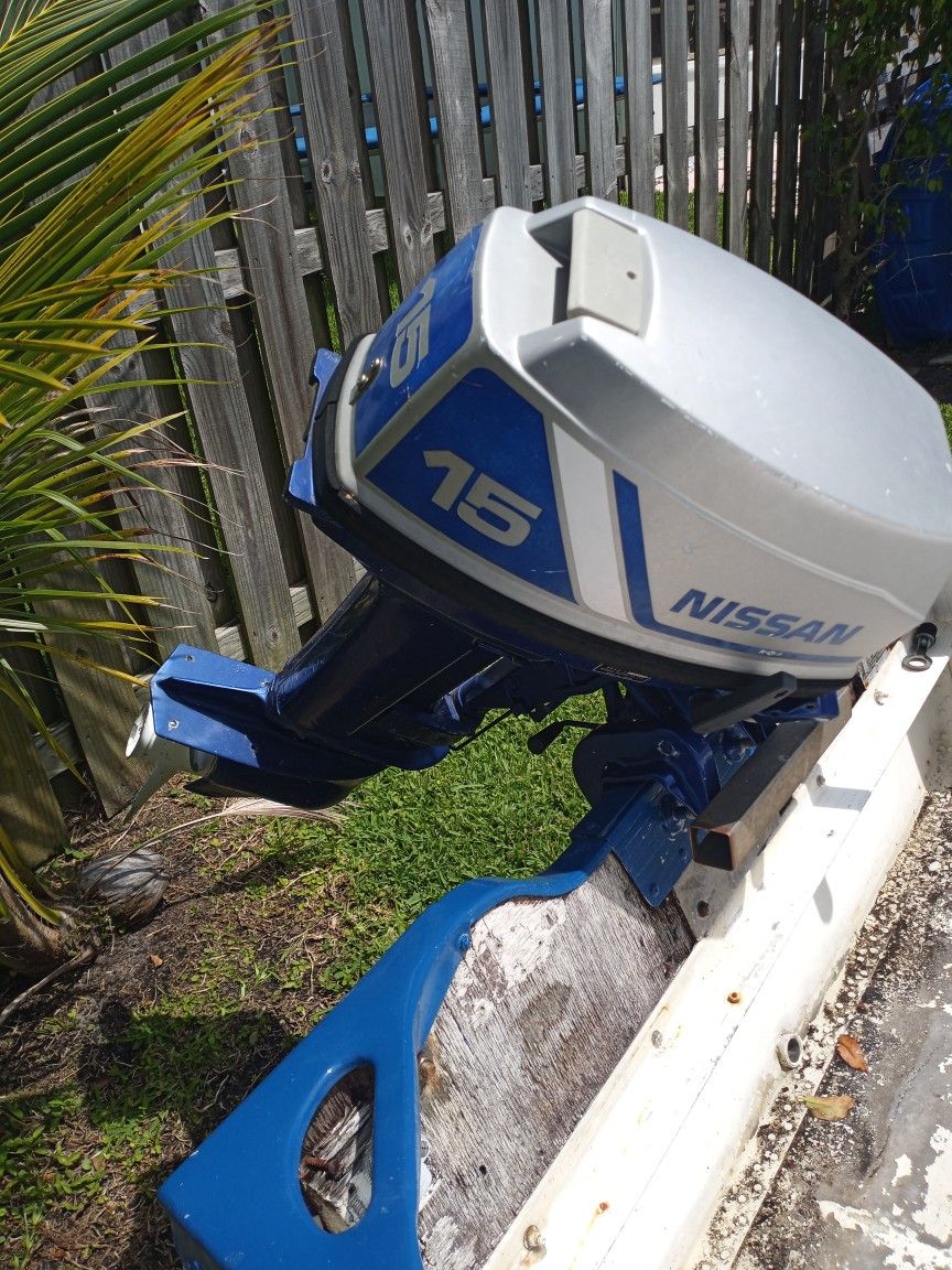 12 Ft Jon Boat Solid. With Trailer And 15 Horsepower Nissan Tiller for