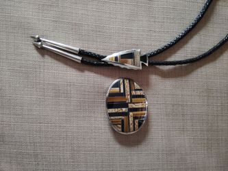Native American belt buckle and bolo set.