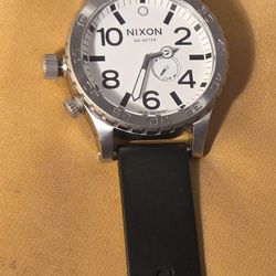 Pre Owen Nixon Simplify, 300 Stainless Steel, Swiss Movement 13B, Nice Condition. No Battery 