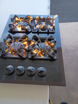 GE, Gas  Stove. 30"inches Long Size    21"1/2 inches Short Size