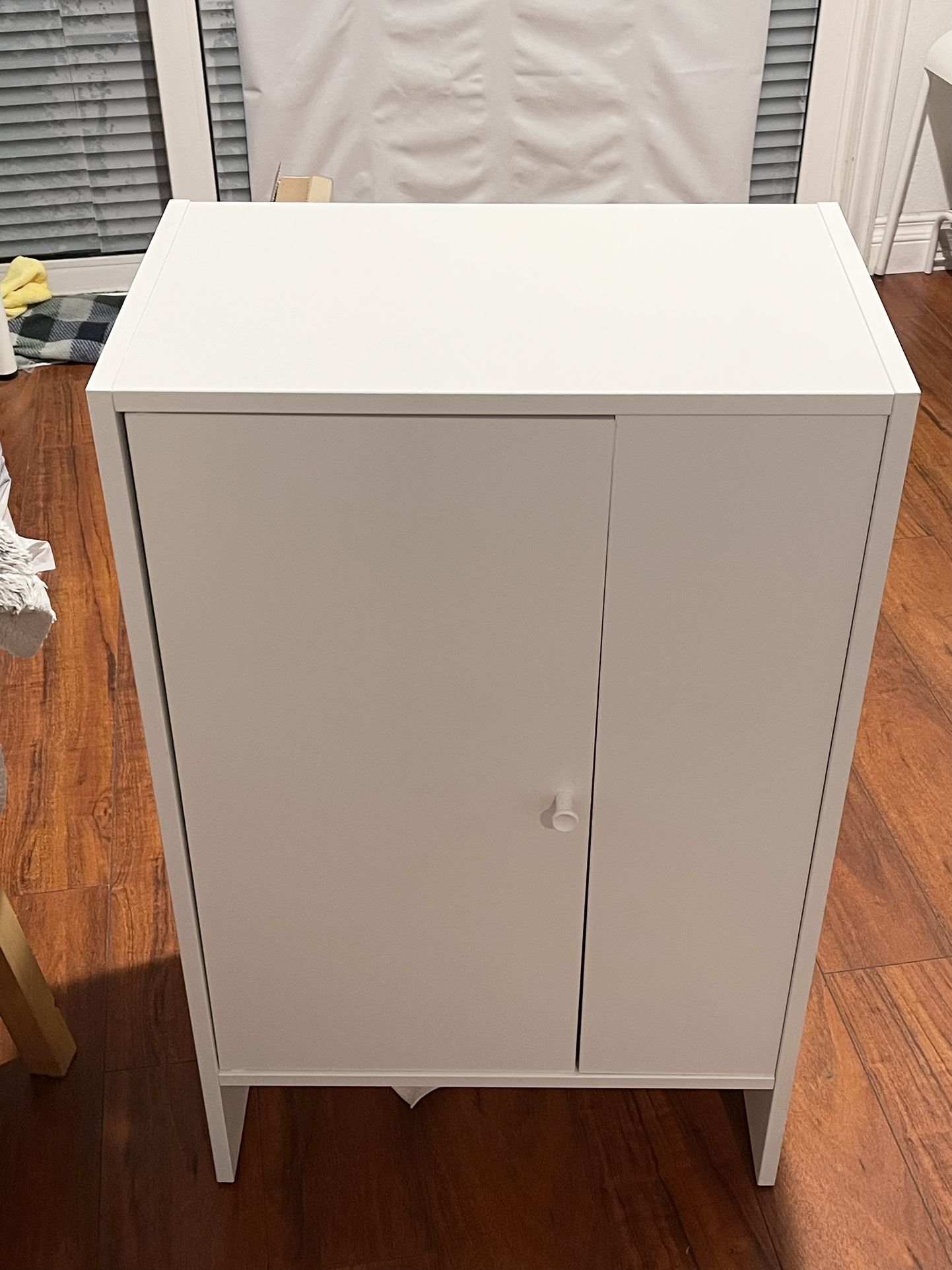 Like new IKEA BAGGEBO Cabinet with door, white, 19 5/8x11 3/4x31 1/2 "