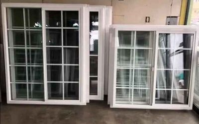 White Vinyl Sliding Windows with Grid