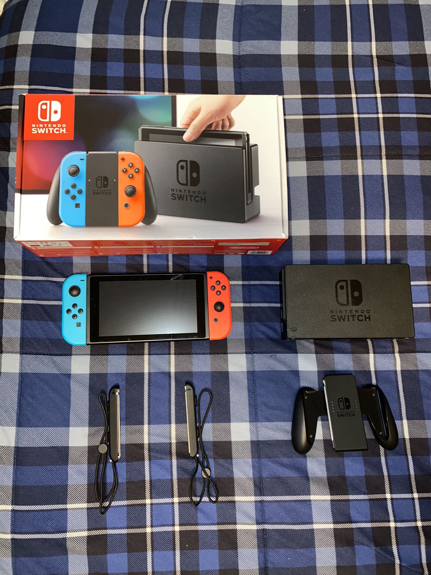 Used Nintendo Switch (basically new) comes with switch dock, Mario cart, Carrying Case and accessories