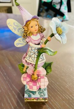 Vintage 2009 Jim Shore Heartwood Creek “Smell the flowers” fairy figurine