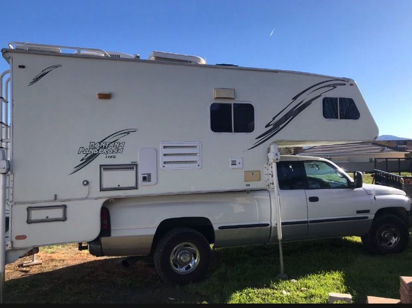 MONTANA LB CAB OVER SELF CONTAINED CAMPER