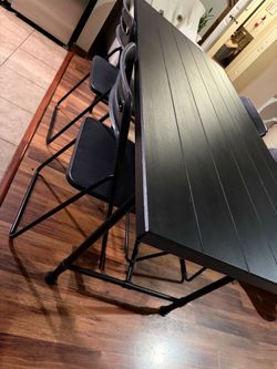 Beautiful IKEA black dining table with 4 chairs ( like new