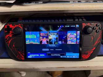 Steam Deck OLED 512GB w/ dbrand KILLSWITCH ULTRA Kit, Original Charger and Case, and Dock.