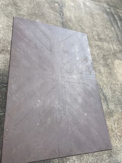 Dark Stained Wood Tabletop with Chevron Pattern