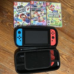 Nintendo Switch + Accessories And Games 