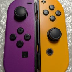 Nintendo Switch Joycons Purple Orange 