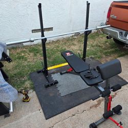 Barbell, weight bench and rack