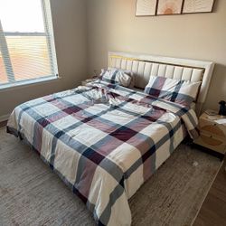 King-size bed with mattress, very new.