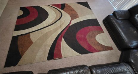 Red and tan area rug 7ftx10ft