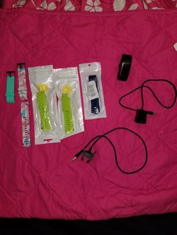 Fitbit Charge 2 Smartwatch. Includes a Screen Protector/ Cover Case, 2 Chargers, 2 Lime Green Bands, Navy Blue, Butterfly Band.125.00 FIRM!