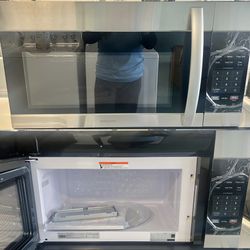 INSIGNIA “ NEW” STAINLESS MICROWAVE OVER THE RANGE ! 