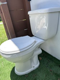 Brand New Toilet with Side Flush Tank – Never Used