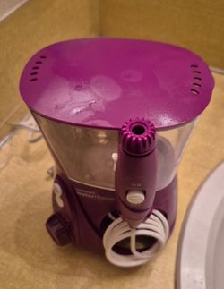 Waterpik Water Flosser – Purple | $40
