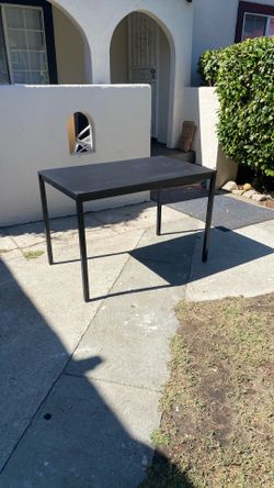 Dining table black color IKEA brand, good condition size L43.5” H29.5” W26.5”