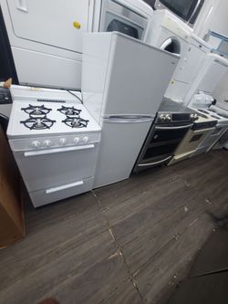 Stove Fridge 24 inches and top of the counter microwave all 3 item $650