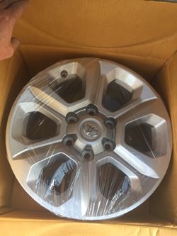 Toyota Factory sr5 premium 4 runner wheels were on the car for 60 miles before they were replaced. Perfect condition in boxes
