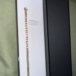Tennis bracelet 10k lyg 10 5.3 g .45 full diamond