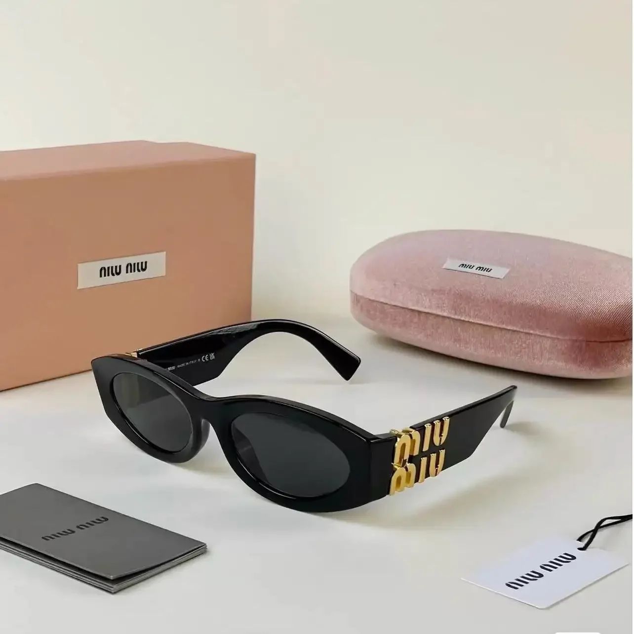 MIU MIU SUNGLASSES