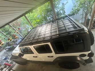 Jeep wrangler Roof rack and step bars.
