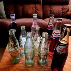 Vintage Coke And Pepsi Bottles 