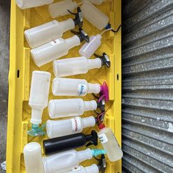 Assorted Spray Bottles Tattoo Barber