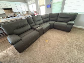 Leather sectional with recliners