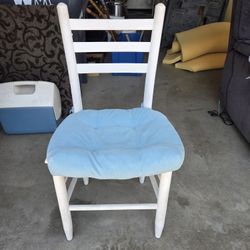 Charming White Wooden Chair with Light Blue Cushion