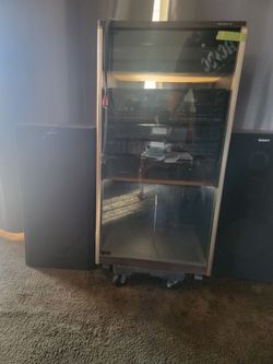 Vinyl stereo cabinet and system.