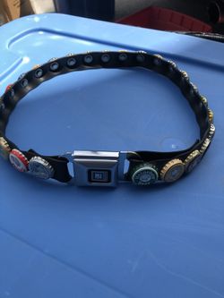 Beer Bottle cap belt with GM Seatbelt buckle, measures 33 inches end to end