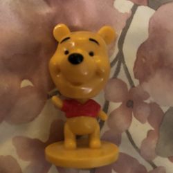 Disney Bobble heads Tweety Bird and Winnie the Pooh Characters. Im perfect condition. A great collectable to have.