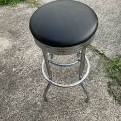 Black vinyl and chrome barstool