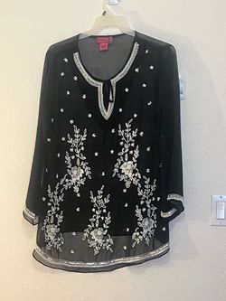 Sheer Black Blouse with, white and silver sequin discs and seed beads accents. Lightweight polyester.
