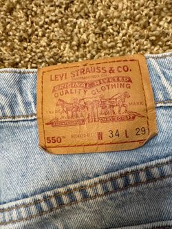 VTG Levi's 550 Relaxed Fit Made in USA Light Wash Jeans Mens Size 34x29