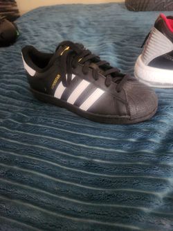 Adidas Black Sneaker with White Stripes